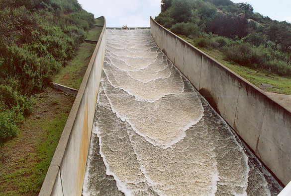 Roll waves on the spillway at Turner reservoir, San Diego County, California.