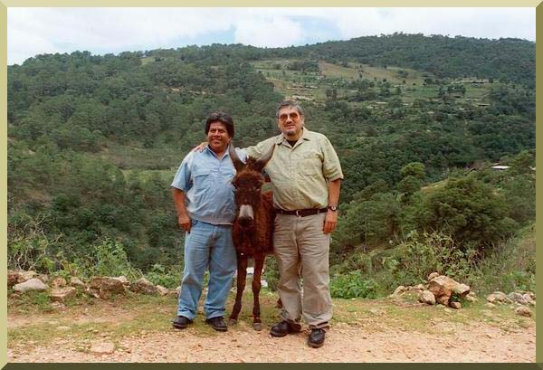 With my friend Jose Perez, D.V.M., and a local burro in the hills of Tlaxiaco, Oaxaca