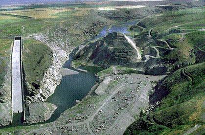 Teton Dam now, on the Snake river, Idaho, showing emergency spillway <br>on the right abutment