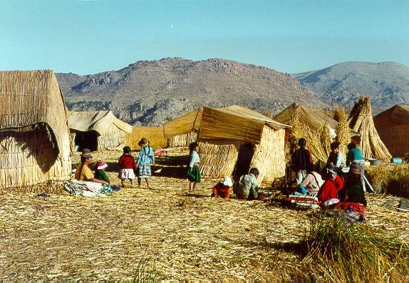 Midafternoon at the island of the Uros, on Lake Titicaca, Puno, Peru.
The Uros have lived on the floating island near Puno for more than 1000 years. 